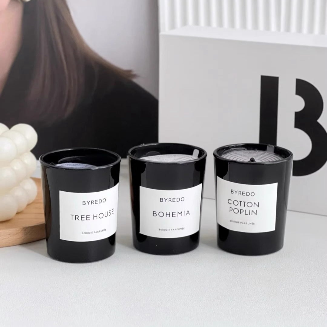 three scents of BYREDO candles.